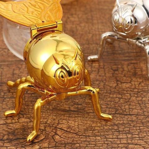 نحوله عسل جناح واحد ذهبي كبير [ عبوه 24]